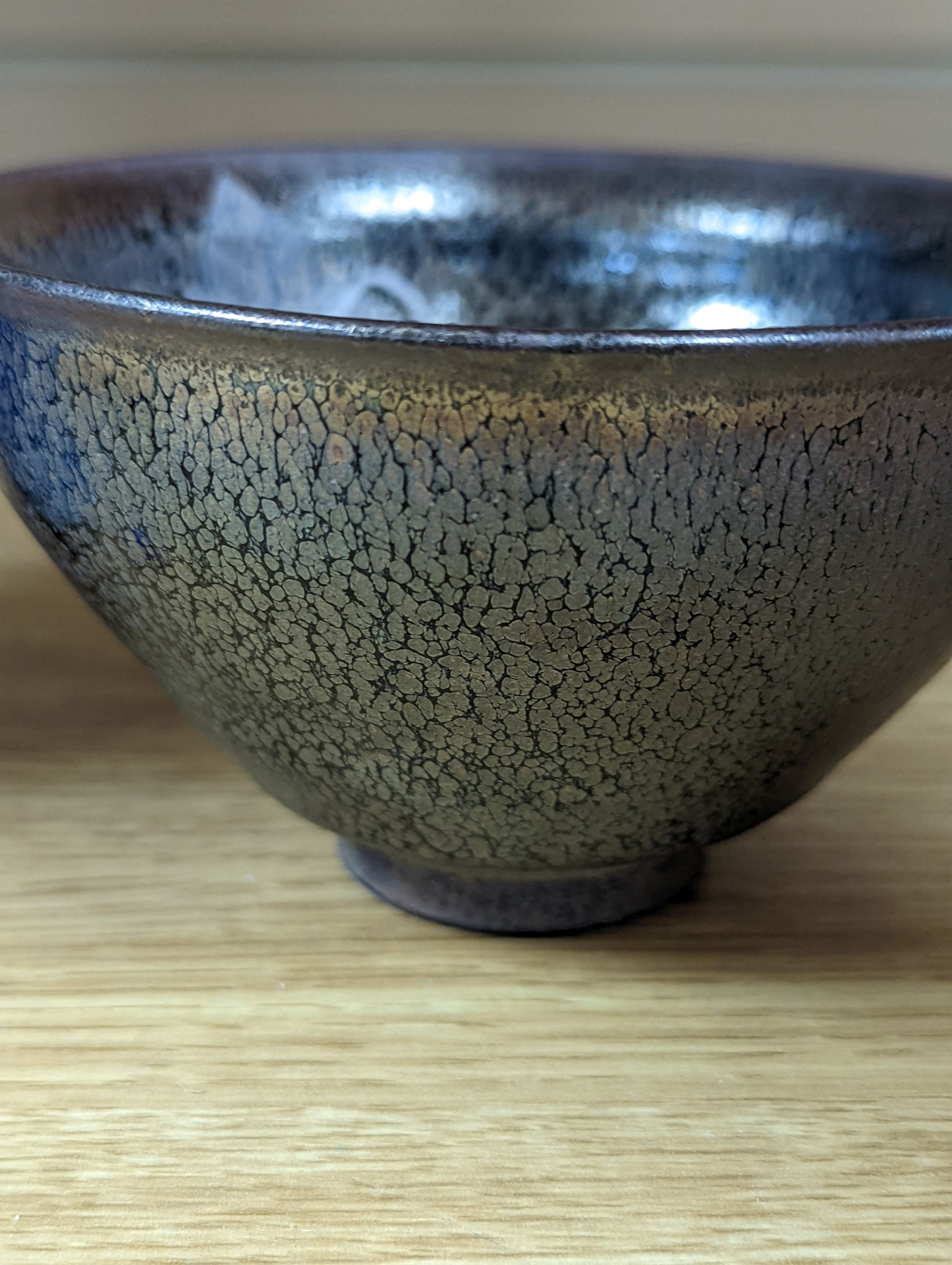 A Chinese high-fired bowl with marks to base - 7.5cm high